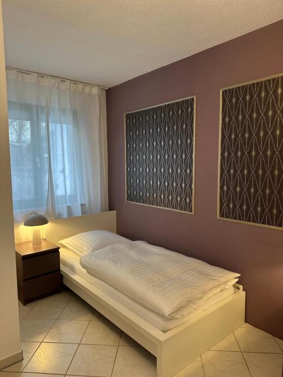 Ένα ή περισσότερα κρεβάτια σε δωμάτιο στο Ruhiges 2 Zimmer Apartment