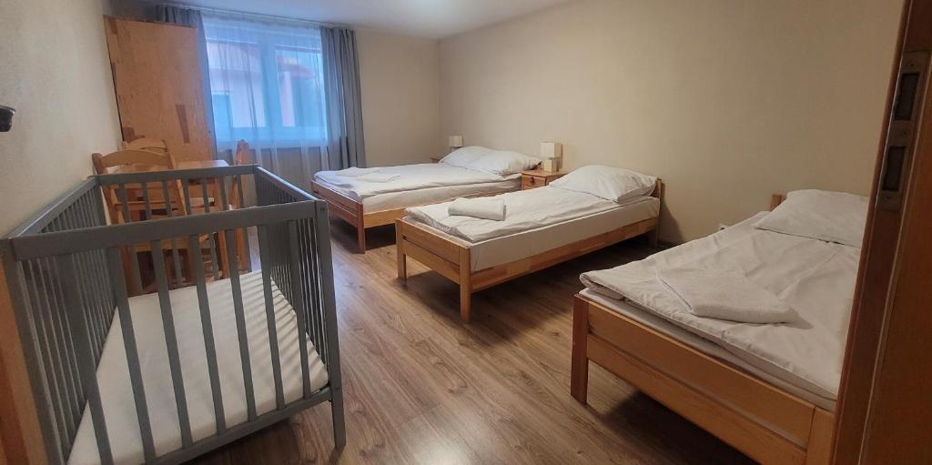 Ένα ή περισσότερα κρεβάτια σε δωμάτιο στο Chałupka Apartament