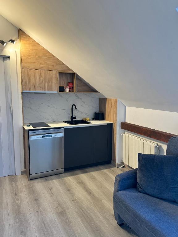 Kuchyň nebo kuchyňský kout v ubytování Acogedor Ático en el Corazón de Formigal - Esquía sin llaves