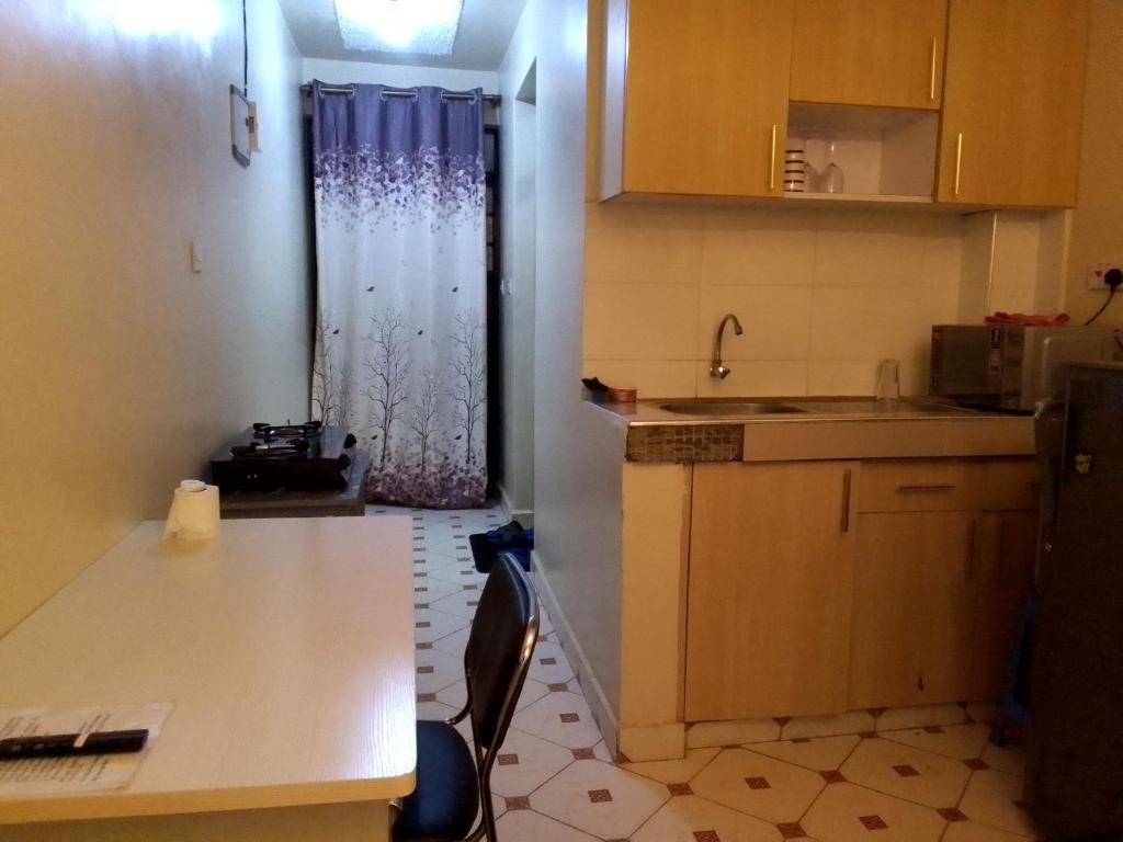 Kuchyň nebo kuchyňský kout v ubytování Fourth House