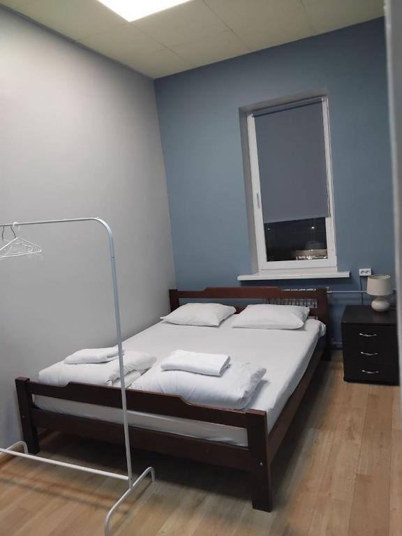 Postel nebo postele na pokoji v ubytování P2B hostel & bar