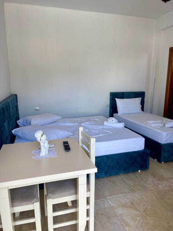 Postel nebo postele na pokoji v ubytování Kristeo`s Apartaments