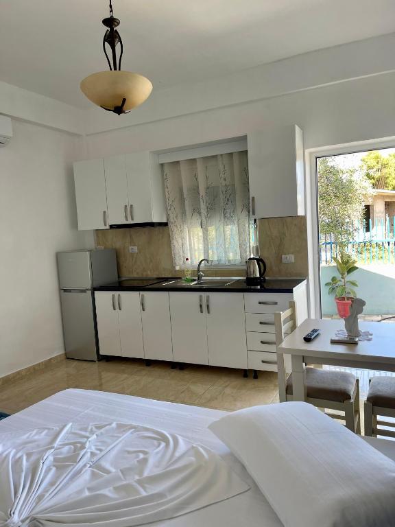 Kuchyň nebo kuchyňský kout v ubytování Kristeo`s Apartaments