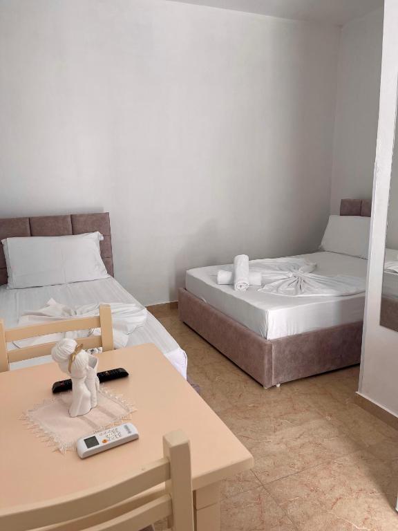 Postel nebo postele na pokoji v ubytování Kristeo`s Apartaments