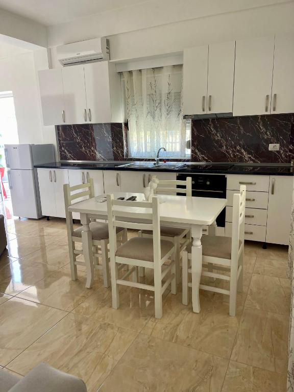 Kuchyň nebo kuchyňský kout v ubytování Kristeo`s Apartaments