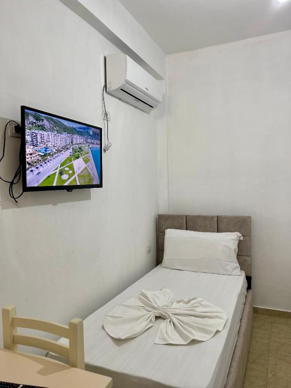 Postel nebo postele na pokoji v ubytování Kristeo`s Apartaments