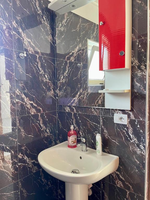 Koupelna v ubytování Kristeo`s Apartaments