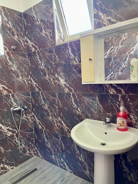 Koupelna v ubytování Kristeo`s Apartaments