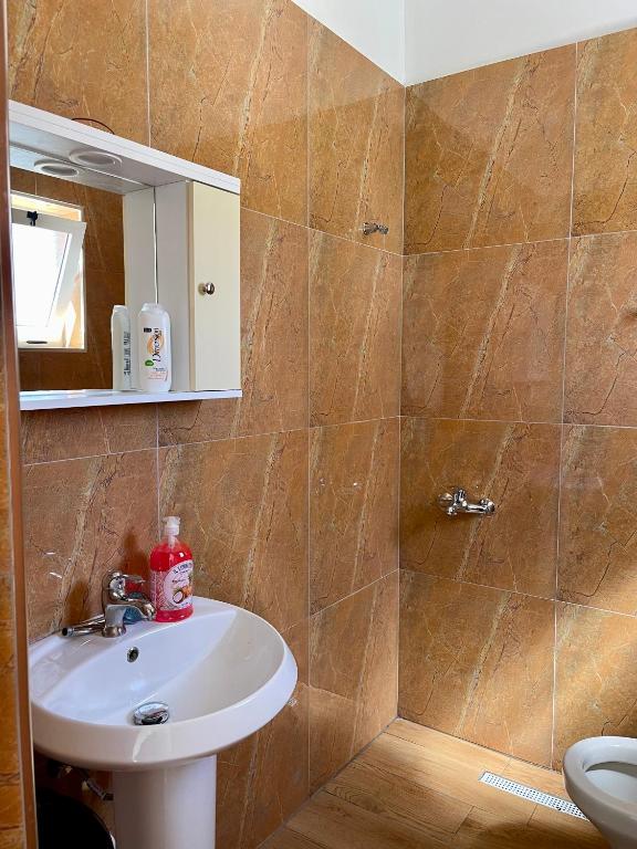 Koupelna v ubytování Kristeo`s Apartaments