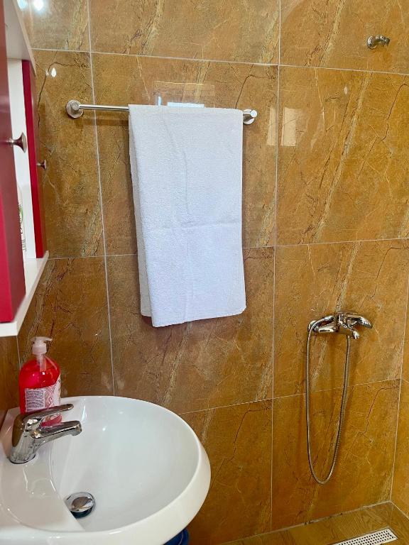 Koupelna v ubytování Kristeo`s Apartaments