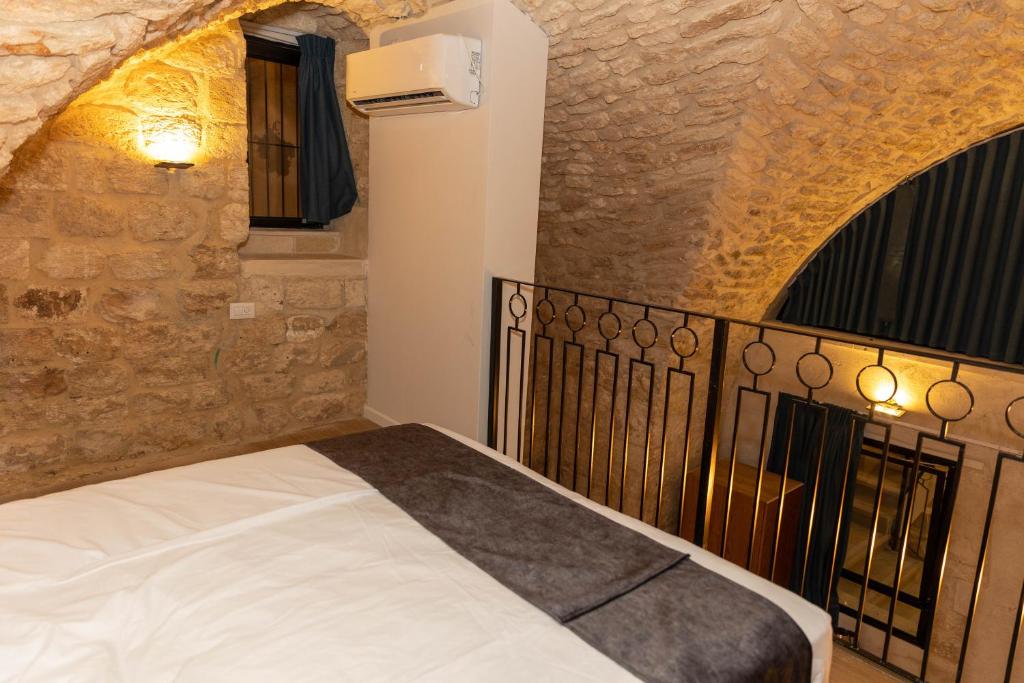 Postel nebo postele na pokoji v ubytování Saint Jacob Hotel