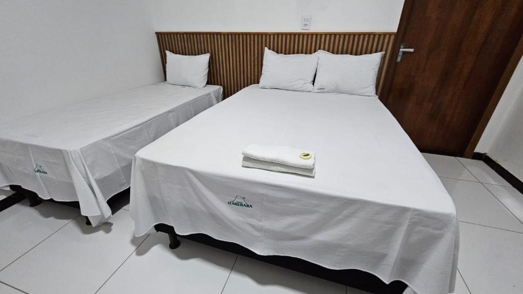 Postel nebo postele na pokoji v ubytování Hotel Itaberaba