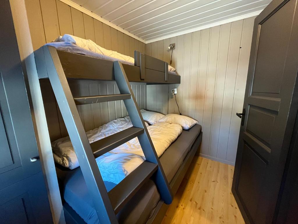 Postel nebo postele na pokoji v ubytování Haglebu Turistheim