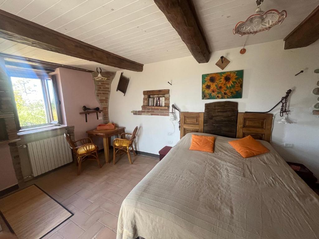 Postel nebo postele na pokoji v ubytování Monte Paradiso Agriturismo