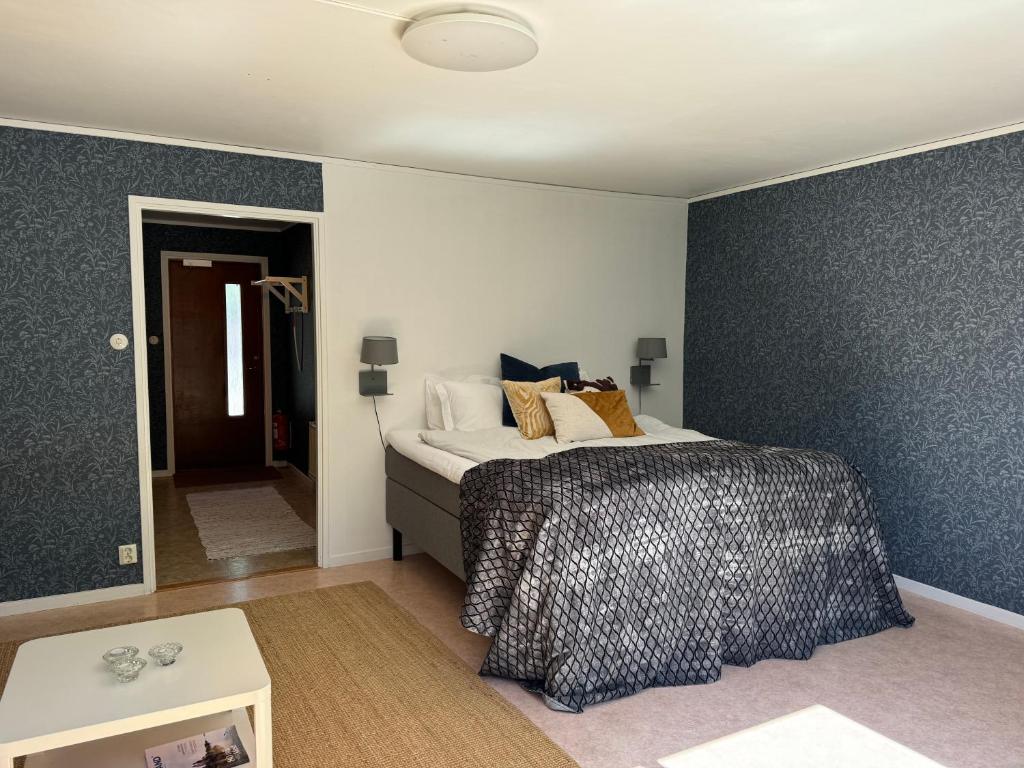 Postel nebo postele na pokoji v ubytování Gåsen Out B&B