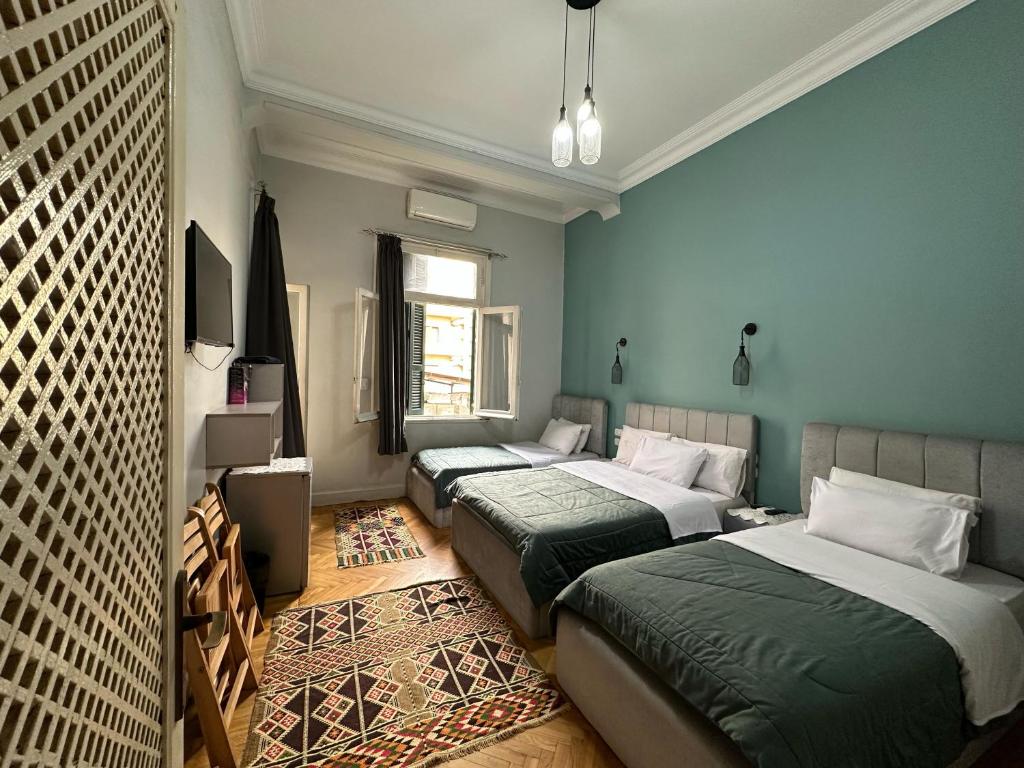 Postel nebo postele na pokoji v ubytování Cheers Hostel Cairo