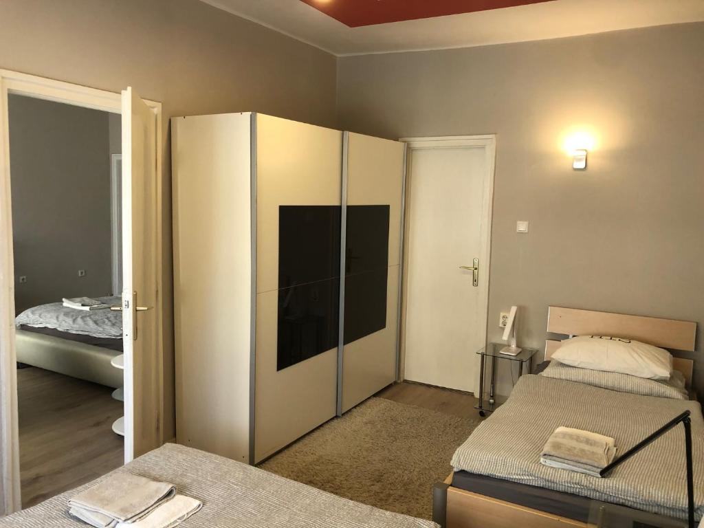 Postel nebo postele na pokoji v ubytování Central