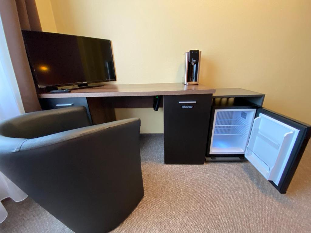 Kuchyň nebo kuchyňský kout v ubytování Adamidis Hotel