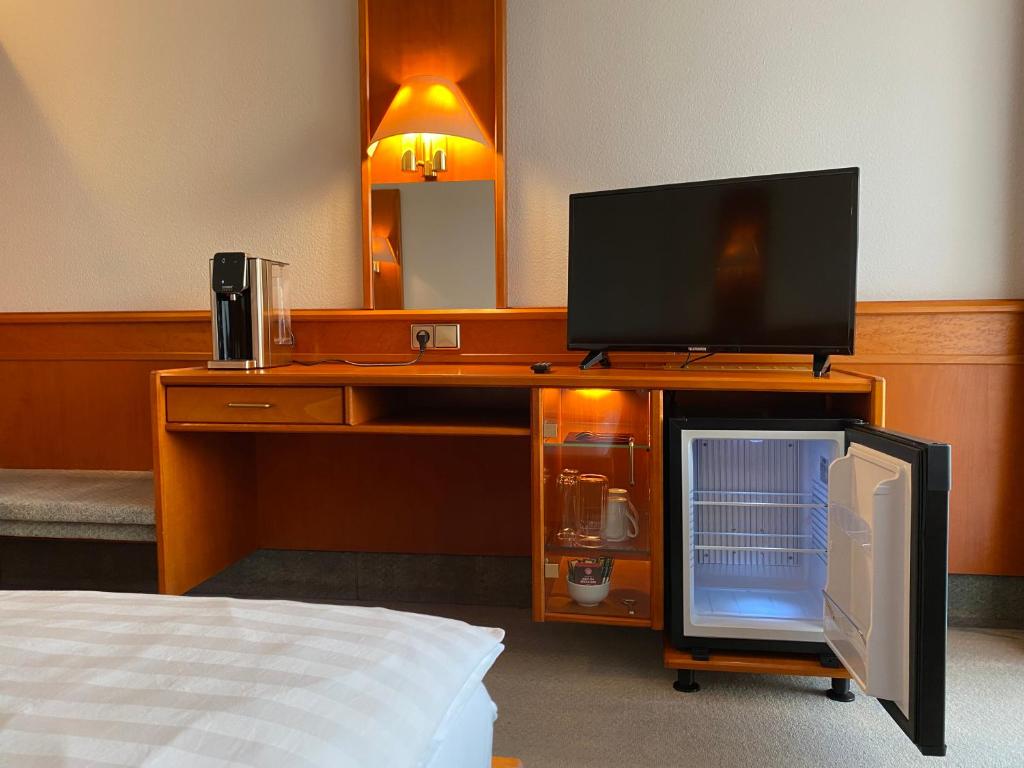 TV a/nebo společenská místnost v ubytování Adamidis Hotel
