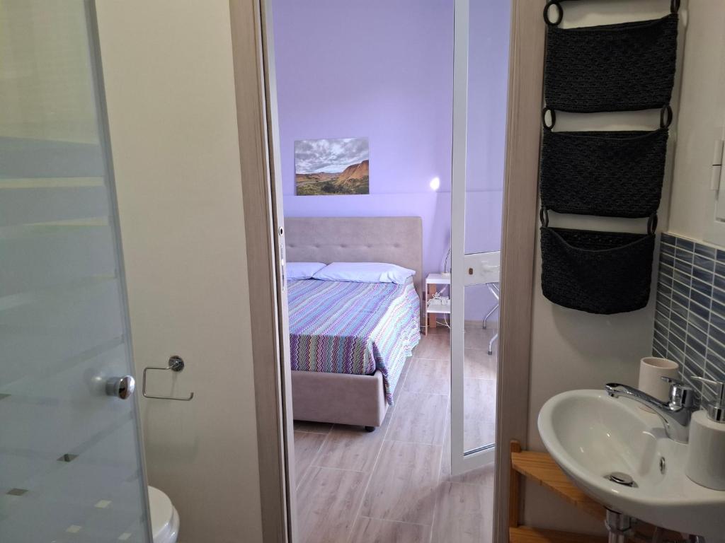 Posteľ alebo postele v izbe v ubytovaní Turtle Island Apartments