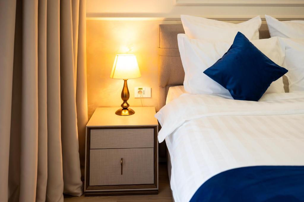 Postel nebo postele na pokoji v ubytování Le Blanc Cotroceni Hotel