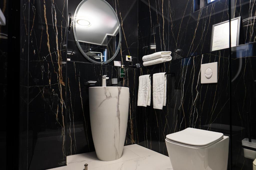 Koupelna v ubytování Le Blanc Cotroceni Hotel