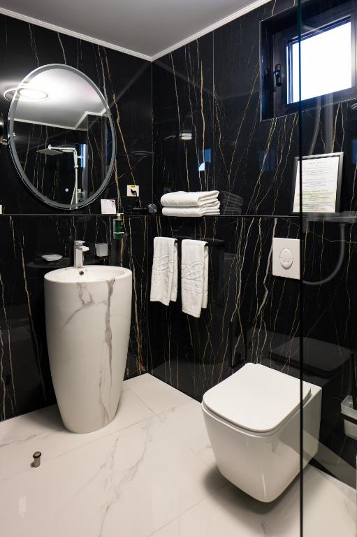 Koupelna v ubytování Le Blanc Cotroceni Hotel