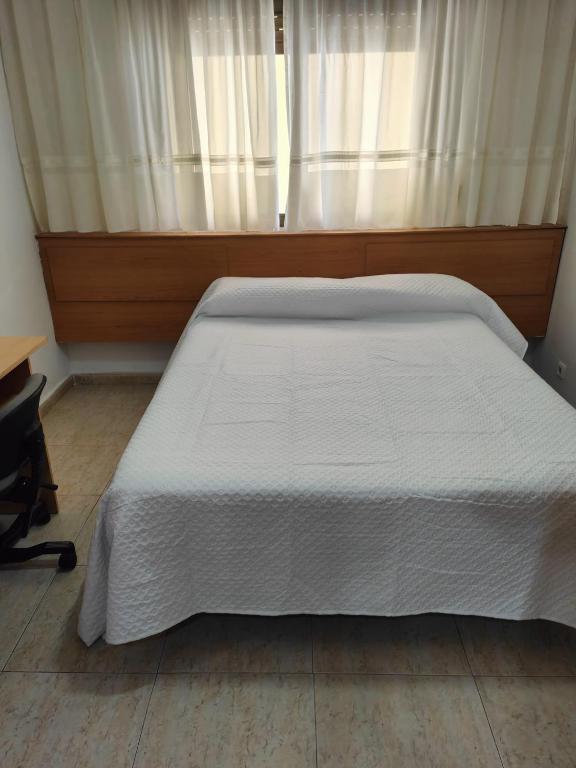 Postel nebo postele na pokoji v ubytování Hostal Jose Luis