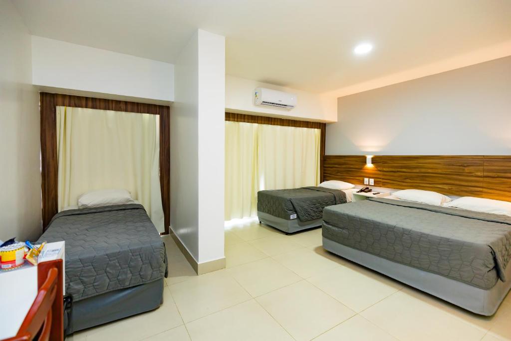 Cama ou camas em um quarto em El Aram Beach & Convention