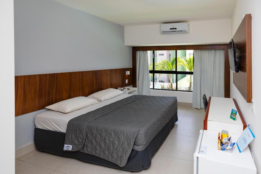 Cama ou camas em um quarto em El Aram Beach & Convention