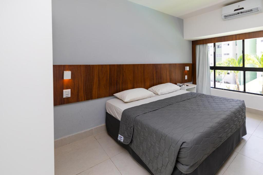 Cama ou camas em um quarto em El Aram Beach & Convention