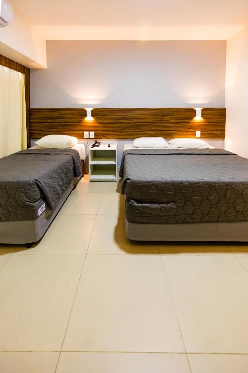 Cama ou camas em um quarto em El Aram Beach & Convention