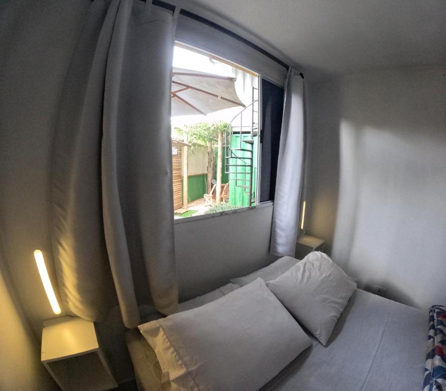 Postel nebo postele na pokoji v ubytování Container Hospedaria Paraty