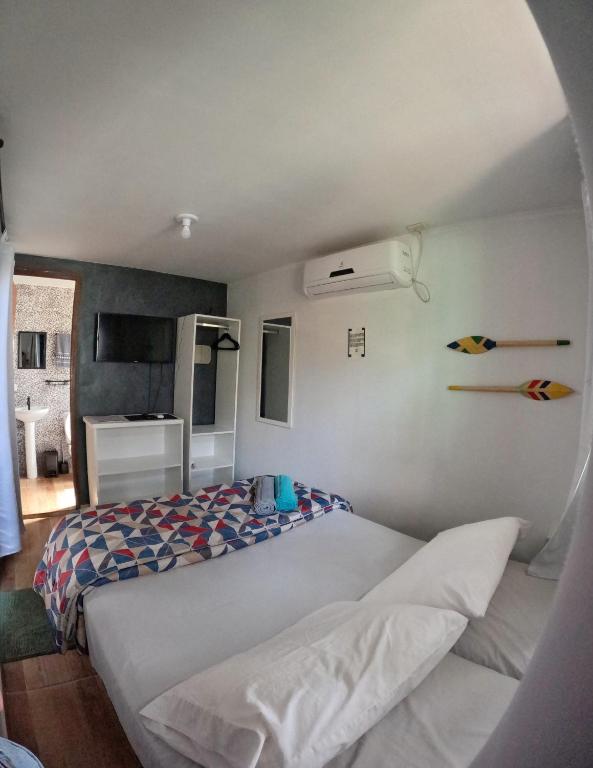 Postel nebo postele na pokoji v ubytování Container Hospedaria Paraty
