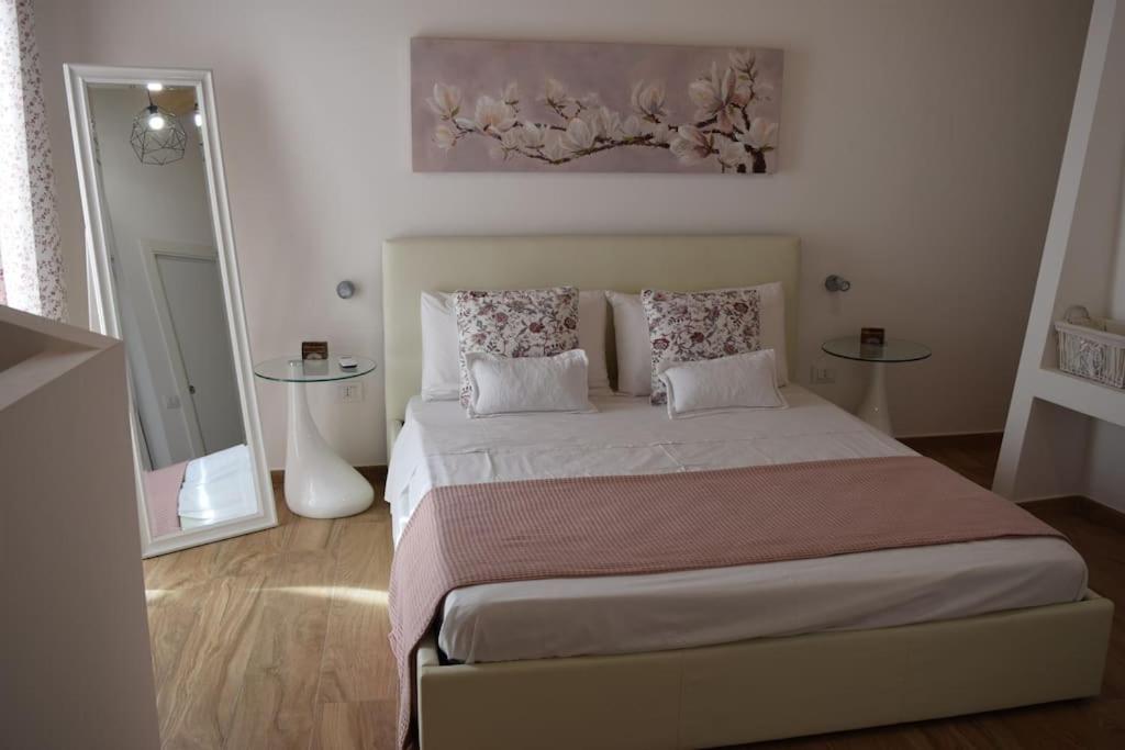 Postel nebo postele na pokoji v ubytování La casa di Mauro