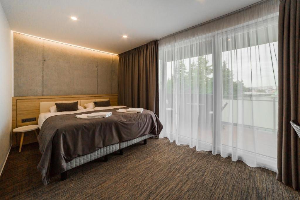 Posteľ alebo postele v izbe v ubytovaní Hotel Dolphin - Adult friendly