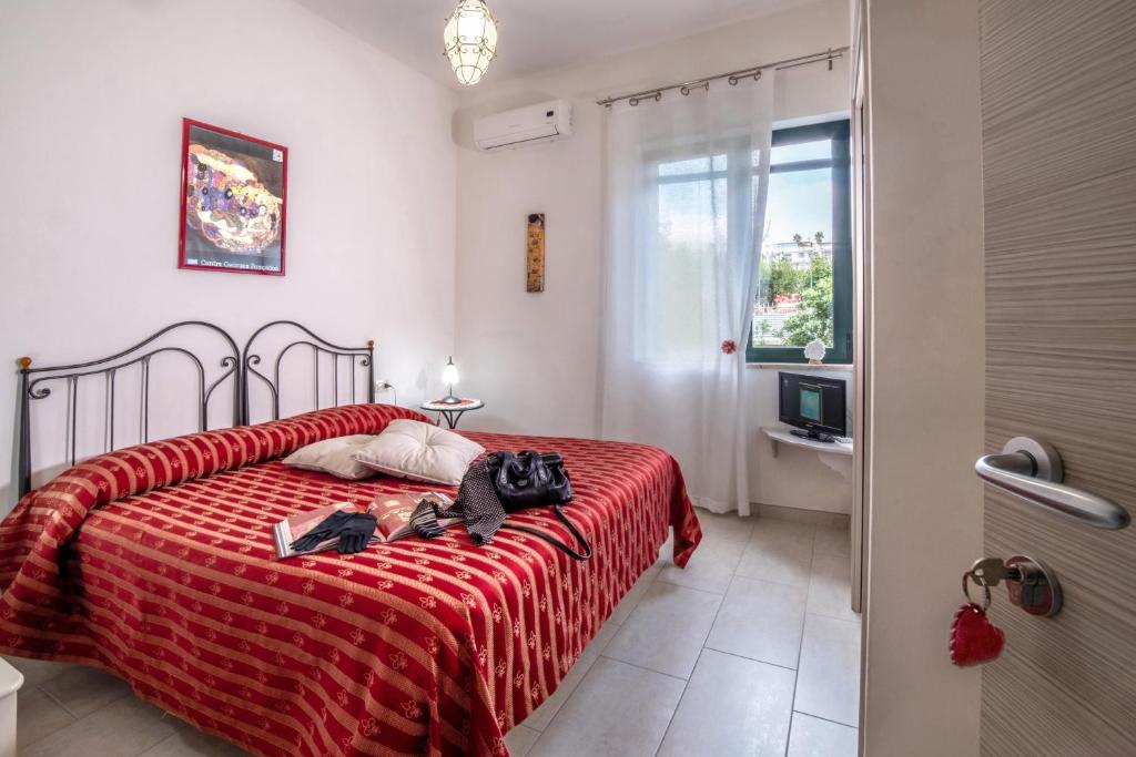Postel nebo postele na pokoji v ubytování Torremerlata B&B