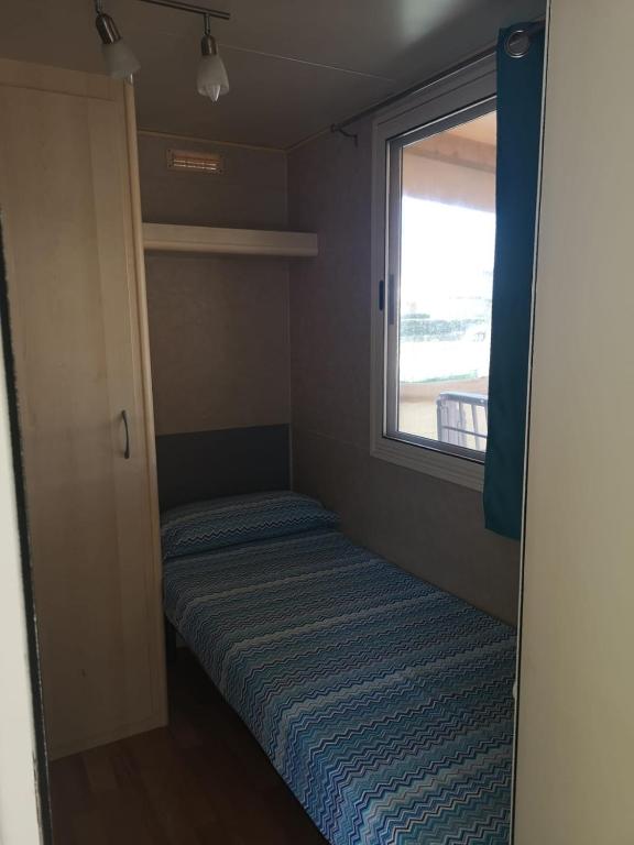 Postel nebo postele na pokoji v ubytování Camping Paradiso