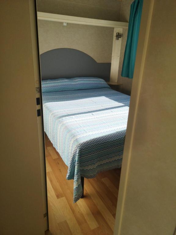 Postel nebo postele na pokoji v ubytování Camping Paradiso
