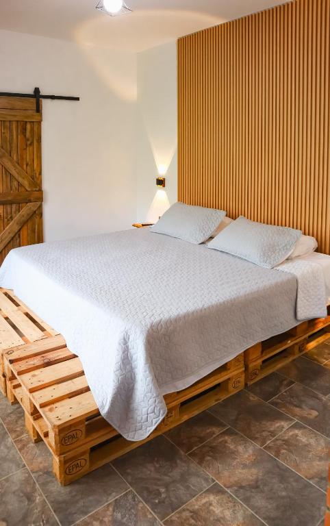 Postel nebo postele na pokoji v ubytování Casa Rural Villa Milú