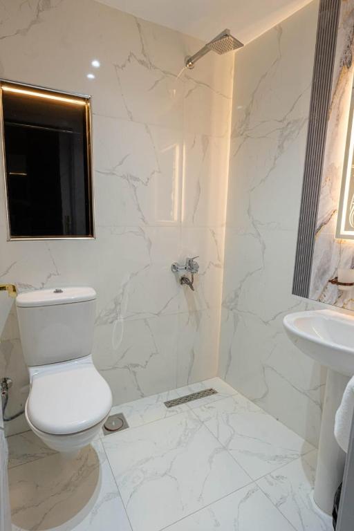 Koupelna v ubytování Lotus Al-Tahrir hotel