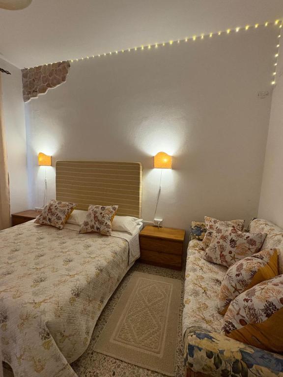 Letto o letti in una camera di Vittorina's Home