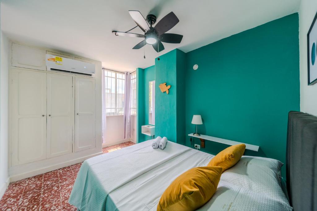 Postel nebo postele na pokoji v ubytování Comodos apartamentos en el centro de Santa Marta