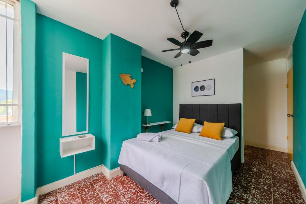 Postel nebo postele na pokoji v ubytování Comodos apartamentos en el centro de Santa Marta