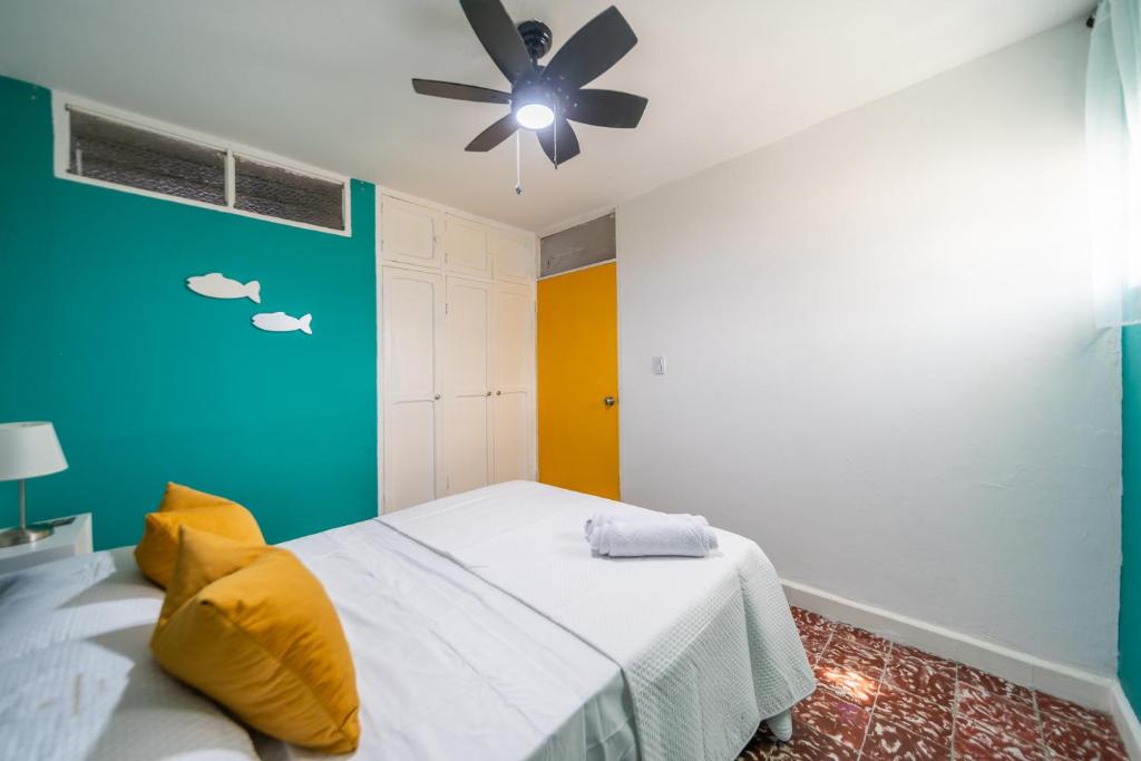 Postel nebo postele na pokoji v ubytování Comodos apartamentos en el centro de Santa Marta