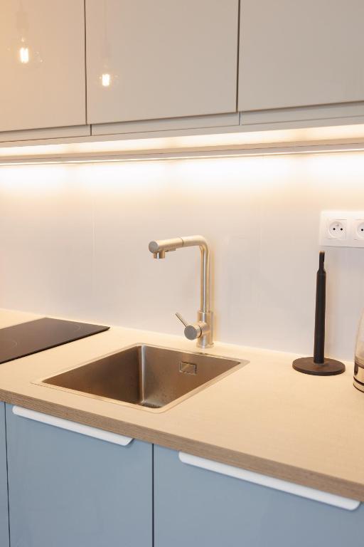 Kuchyň nebo kuchyňský kout v ubytování Moderný apartmán v srdci Martina