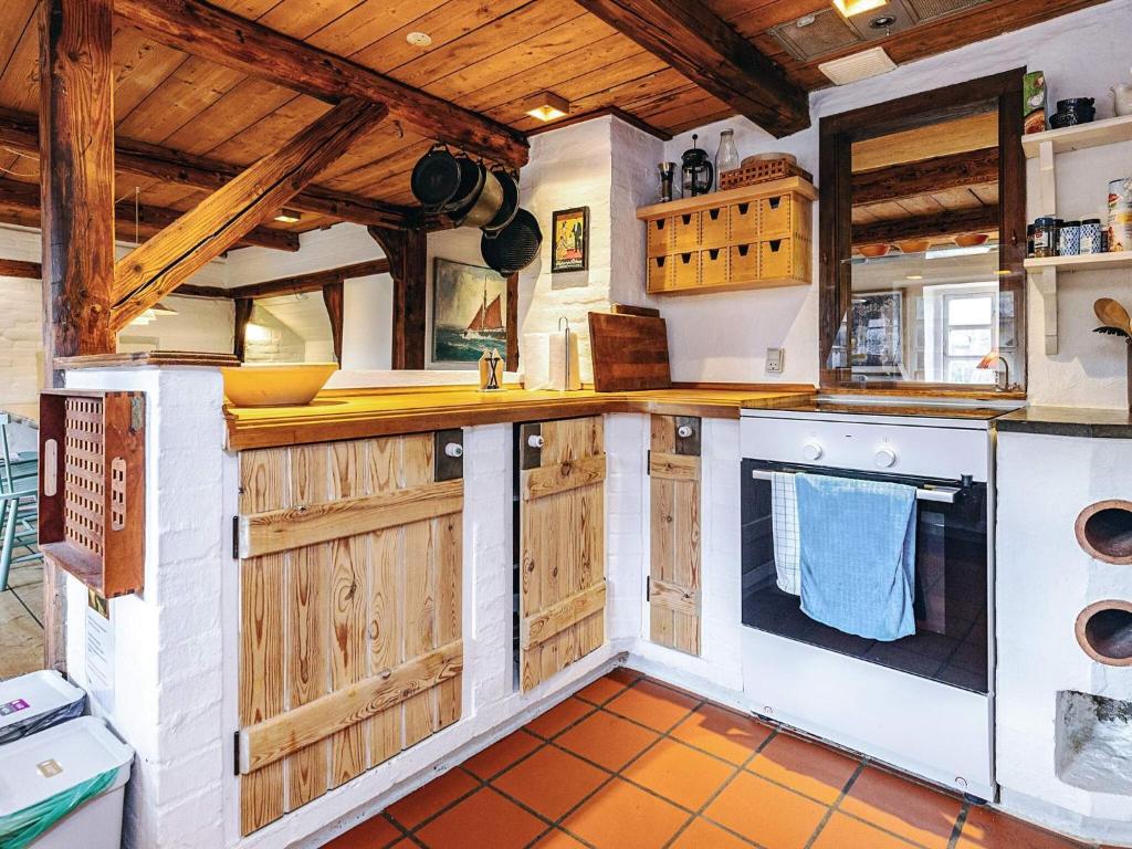 Kuchyň nebo kuchyňský kout v ubytování Holiday home Asaa II