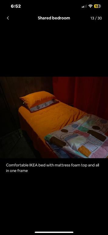 a picture of a bed in a room at Tarawa drive in Cincinnati