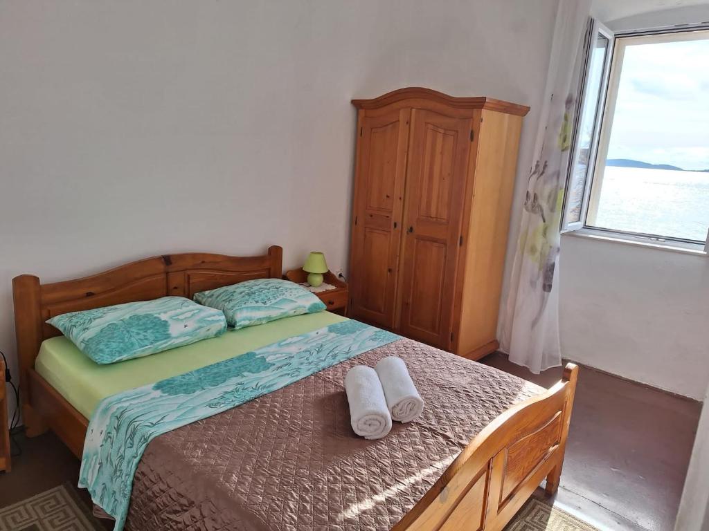 Postel nebo postele na pokoji v ubytování Seaside holiday house Orebic, Peljesac - 23750