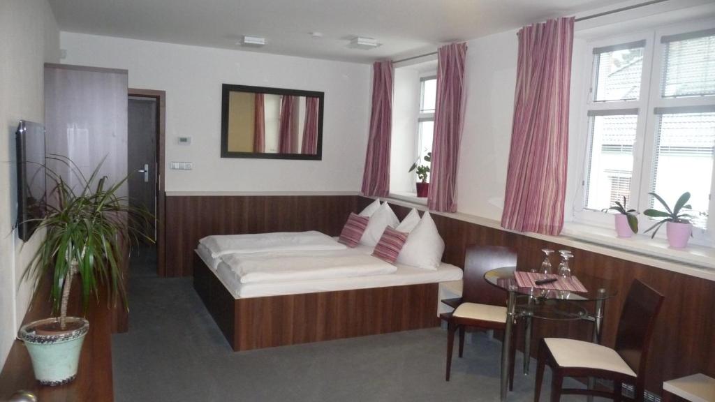Postel nebo postele na pokoji v ubytování Graphic Hotel